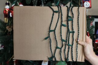 Wrap lights around cardboard