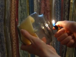 candle with difficult-to-reach wick